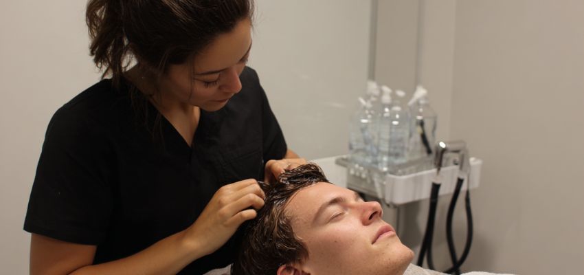 The man has a dry scalp.
